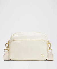 lululemon Everywhere Crossbody Bag 2L *Metal Hardware - LIGHT IVORY / GOLD