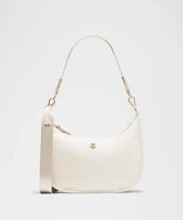 lululemon City Essentials Small Shoulder Bag 3L - LIGHT IVORY / GOLD