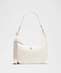 lululemon City Essentials Small Shoulder Bag 3L - LIGHT IVORY / GOLD
